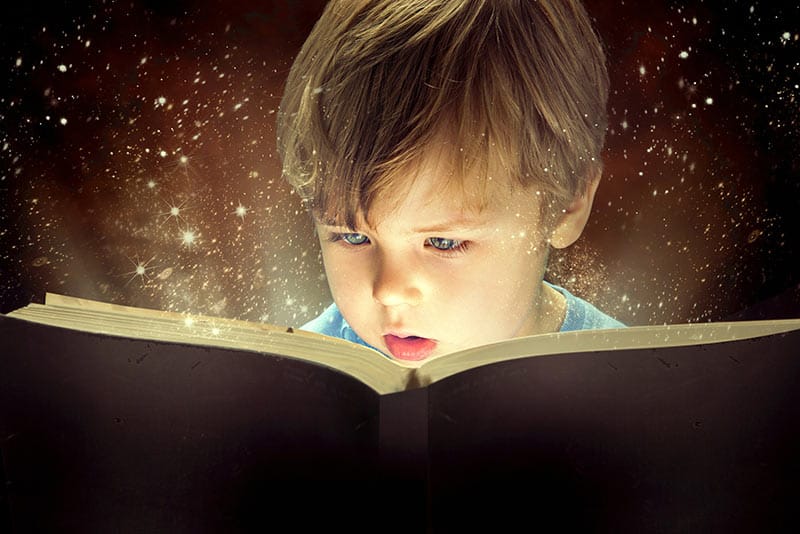 child-reading-magical-book